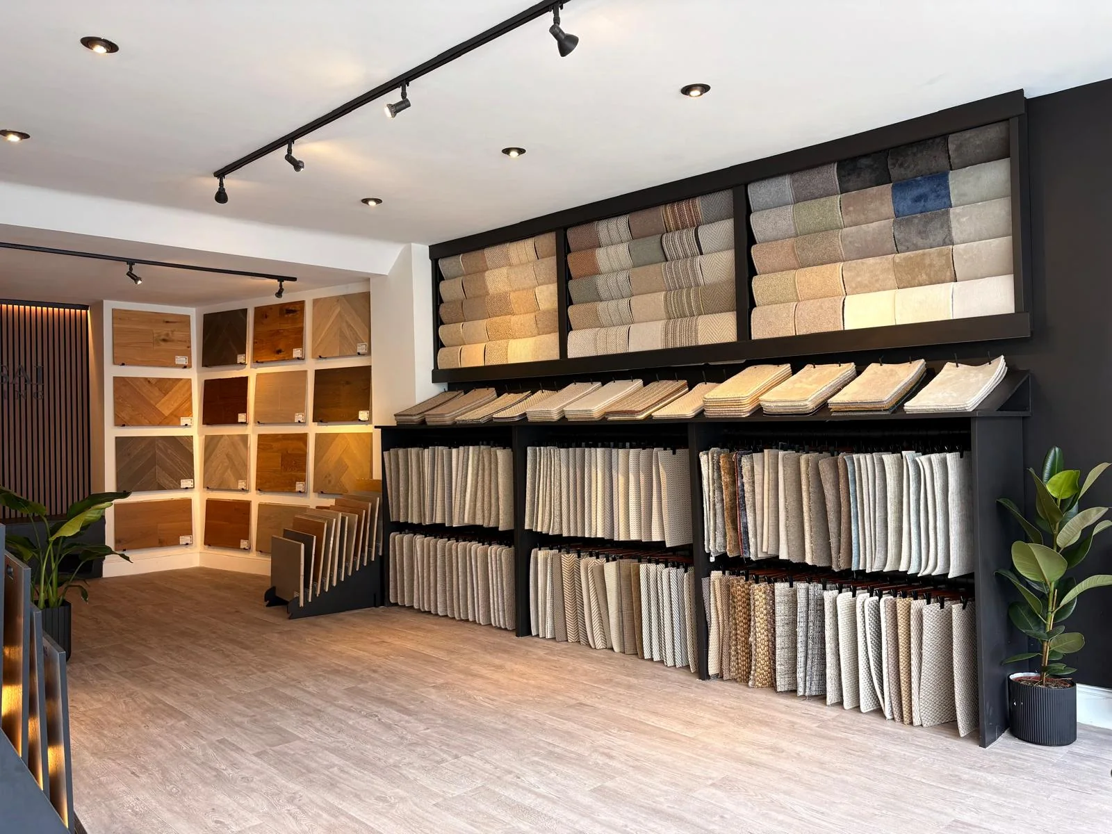 Carpet and wood flooring displays inside the Bonsai Flooring showroom in Hungerford