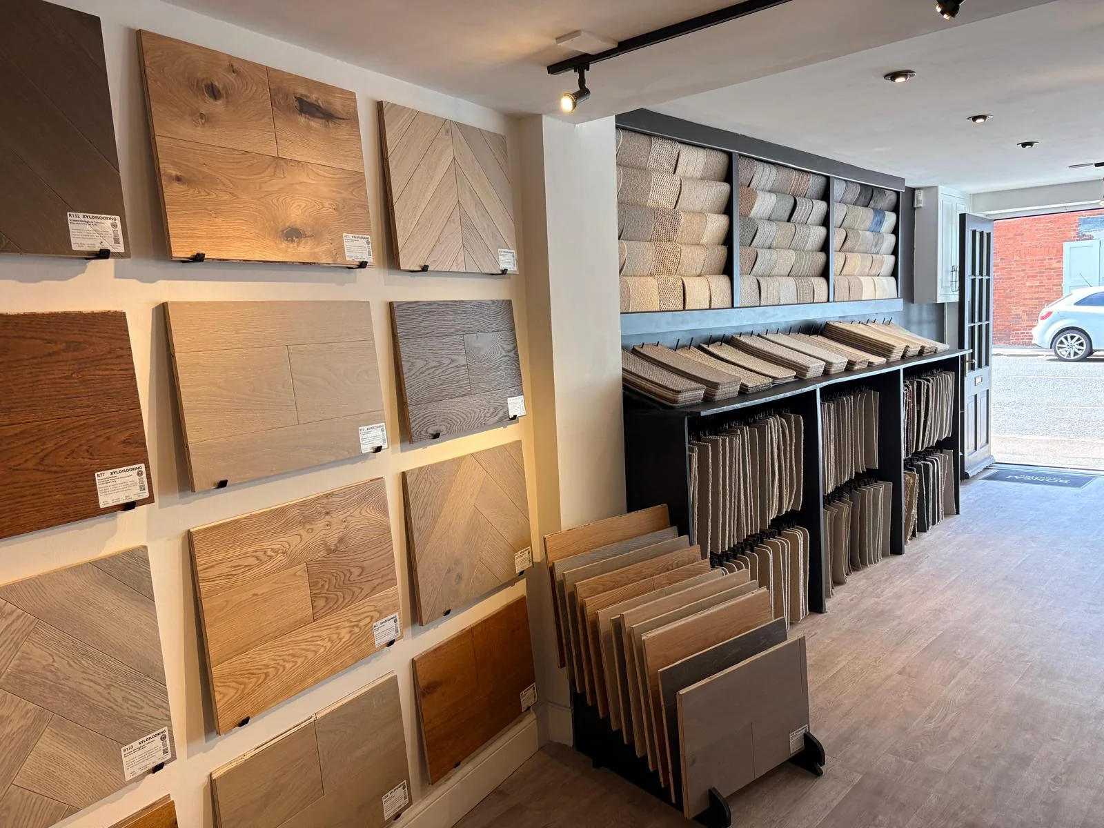 Engineered wood and carpet sample displays inside the Hungerford showroom